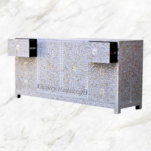 Side view of an Alexa Grey Media Cabinet with two open drawers 3