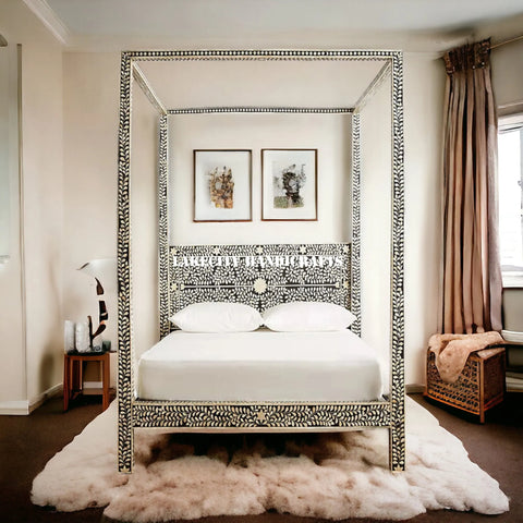 Decorative four-poster bed in a bedroom with white bedding and a textured rug.