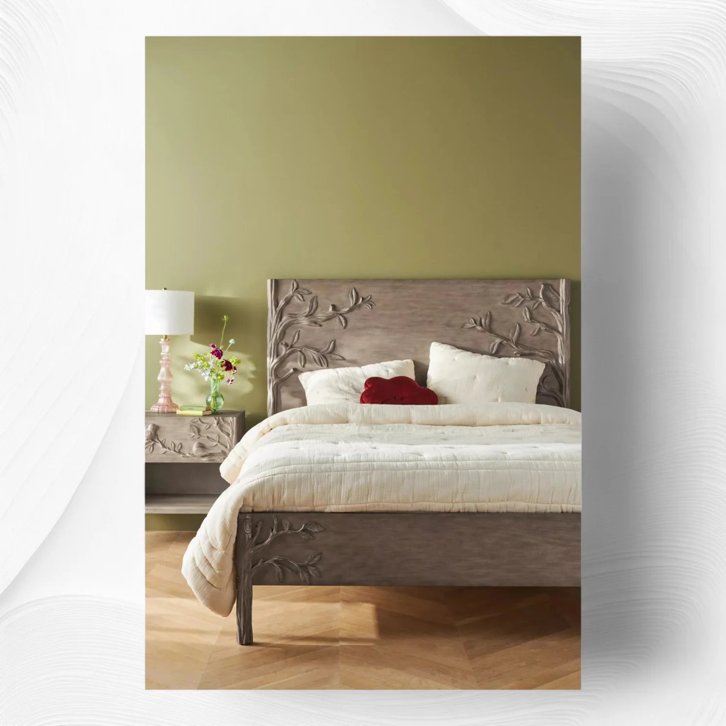 Brown hand-carved Ornithology bed styled in a bedroom