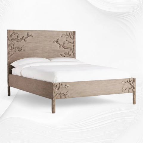 Three-quarter view of brown carved mango wood bed frame