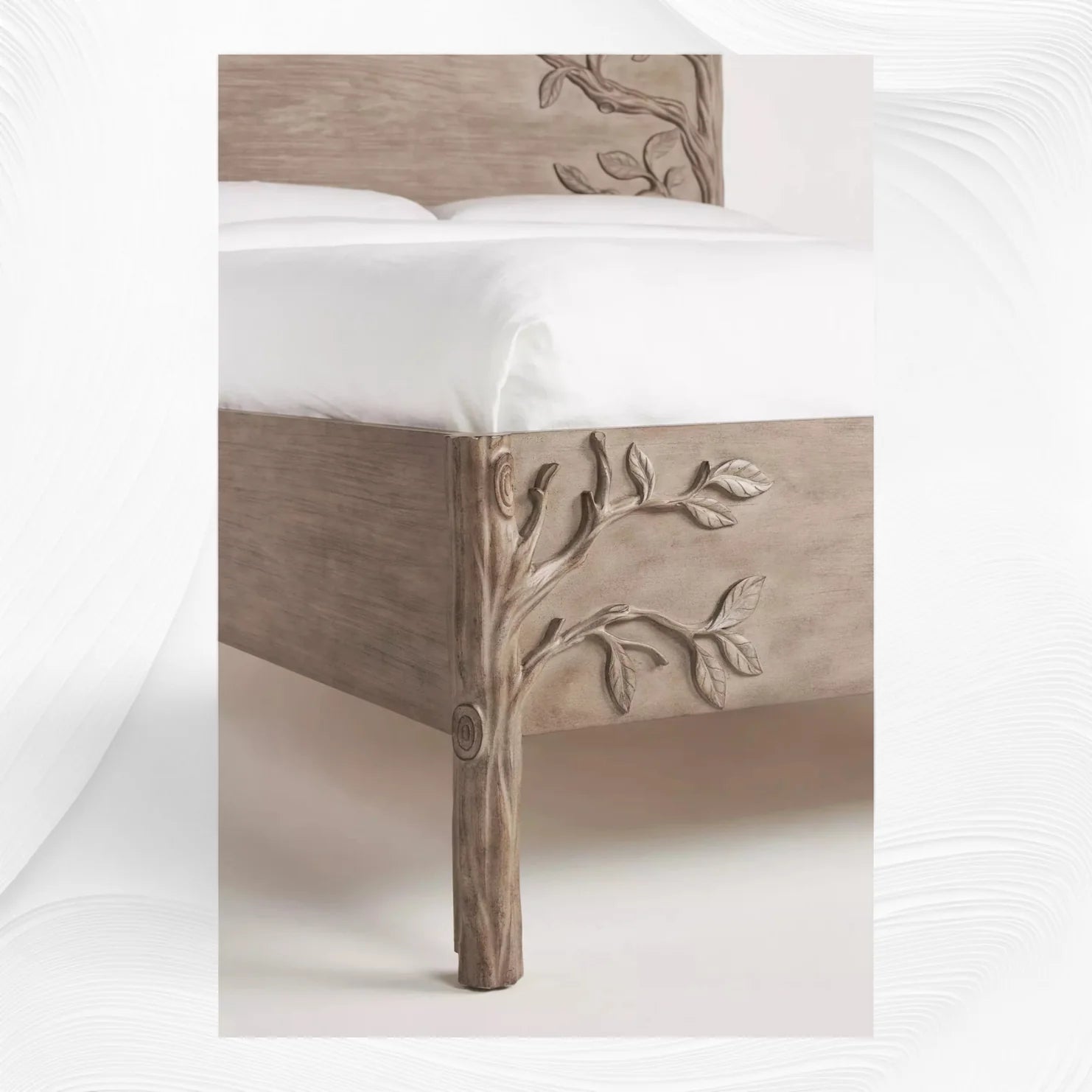 Close-up of carved branch details on brown wood bed footboard